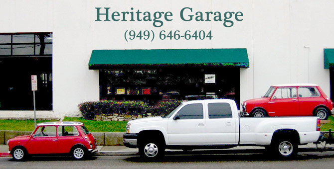 Heritage Garage Exterior with Red Mini on a Pick-up Truck